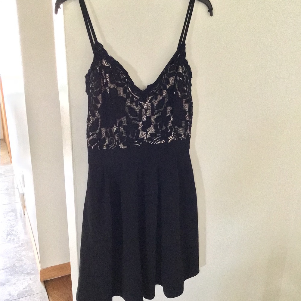 Nude and black fit and flare dress